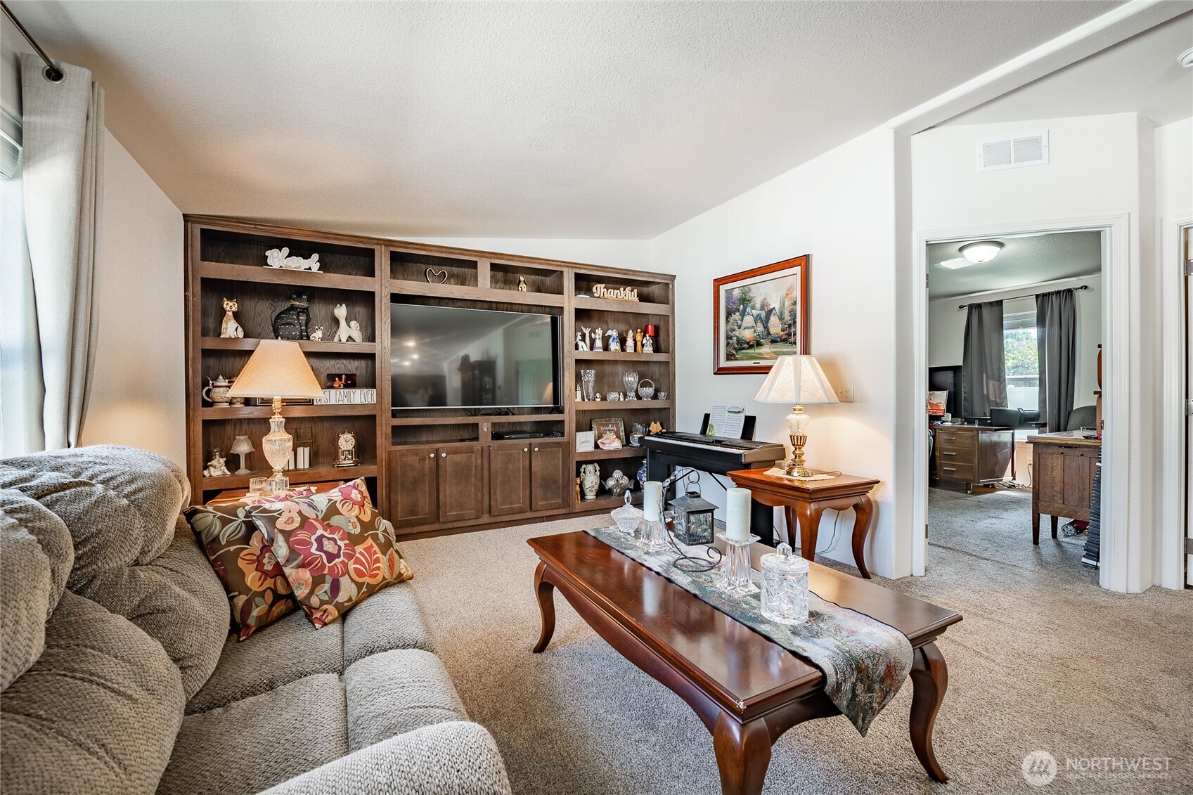 6350 Portal Way, Unit 83 Ferndale, WA 98248 - Photo 17 of 40 a living room with furniture and a flat screen tv