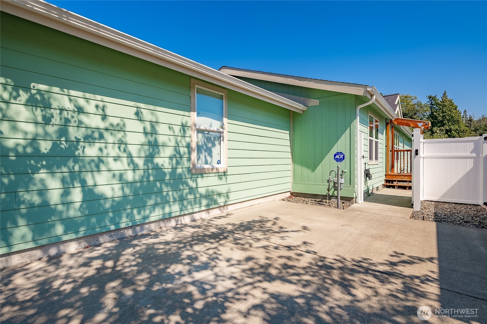 6350 Portal Way, Unit 83 Ferndale, WA 98248 - Photo 2 of 40 a view of a backyard