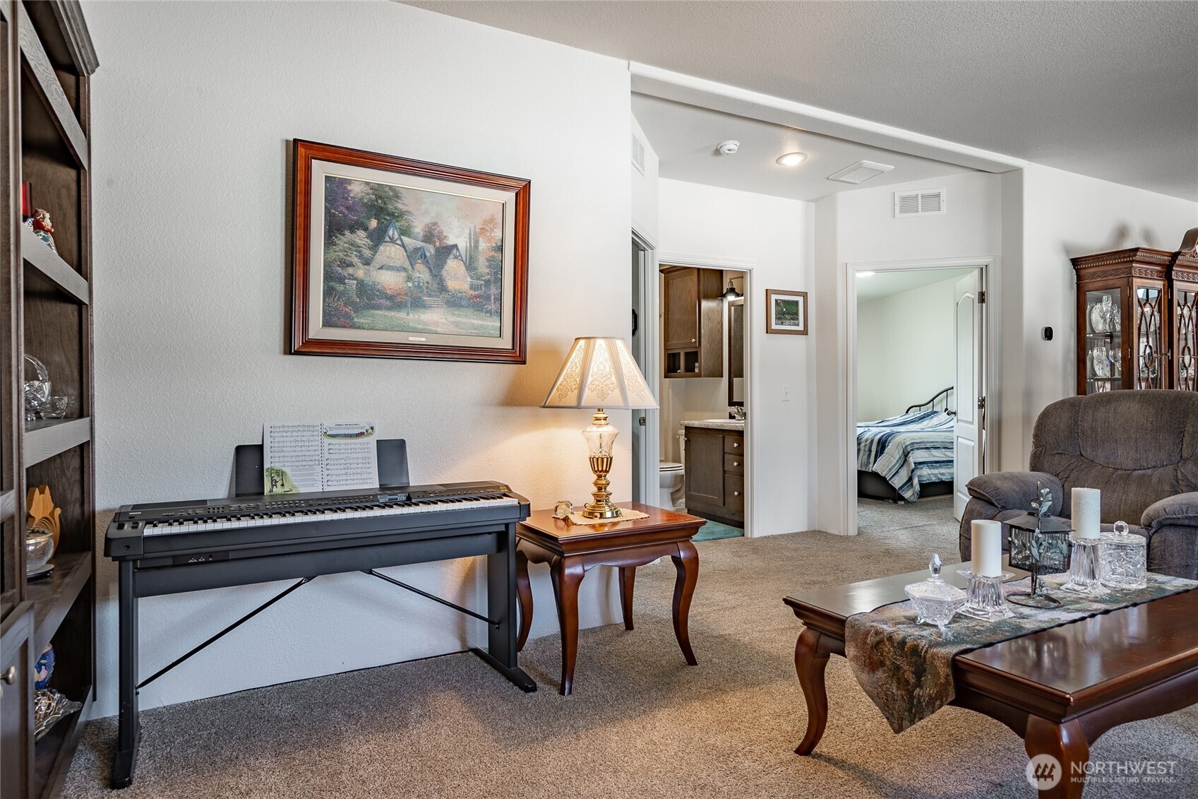 6350 Portal Way, Unit 83 Ferndale, WA 98248 - Photo 21 of 40 a living room with furniture and a piano
