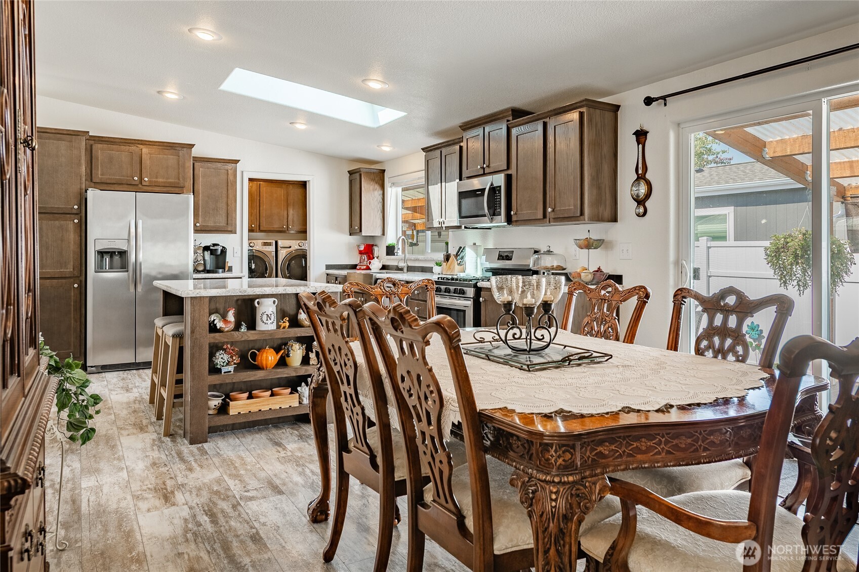 6350 Portal Way, Unit 83 Ferndale, WA 98248 - Photo 22 of 40 a view of a dining room with furniture window and outside view