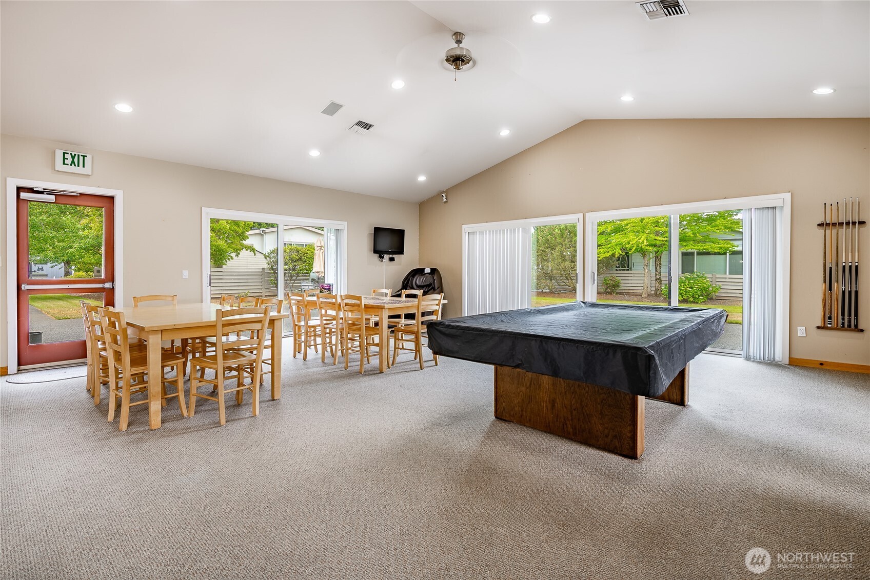 6350 Portal Way, Unit 83 Ferndale, WA 98248 - Photo 36 of 40 a room with lots of furniture and a table