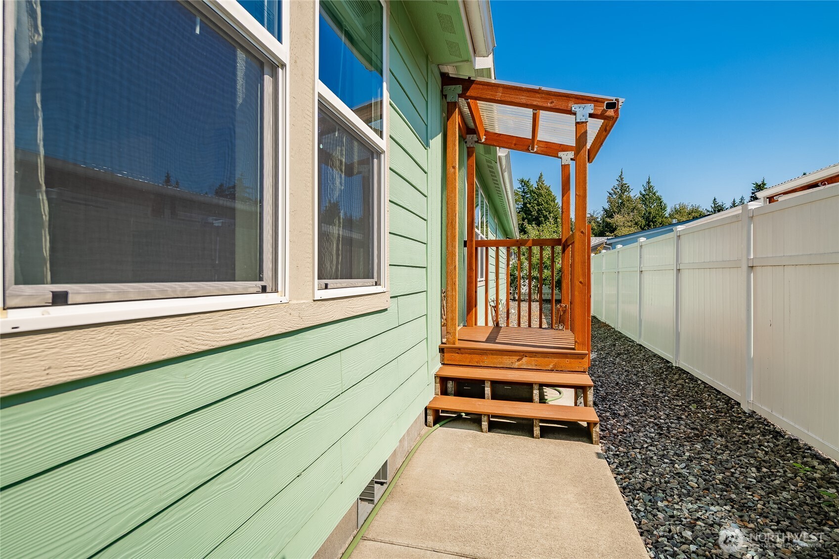 6350 Portal Way, Unit 83 Ferndale, WA 98248 - Photo 4 of 40 a view of a house with a large window