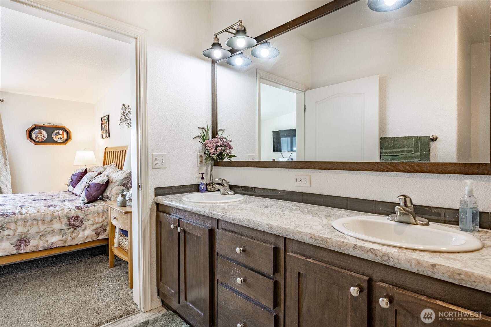 6350 Portal Way, Unit 83 Ferndale, WA 98248 - Photo 10 of 40 a en suite bathroom with a double vanity sink and a mirror