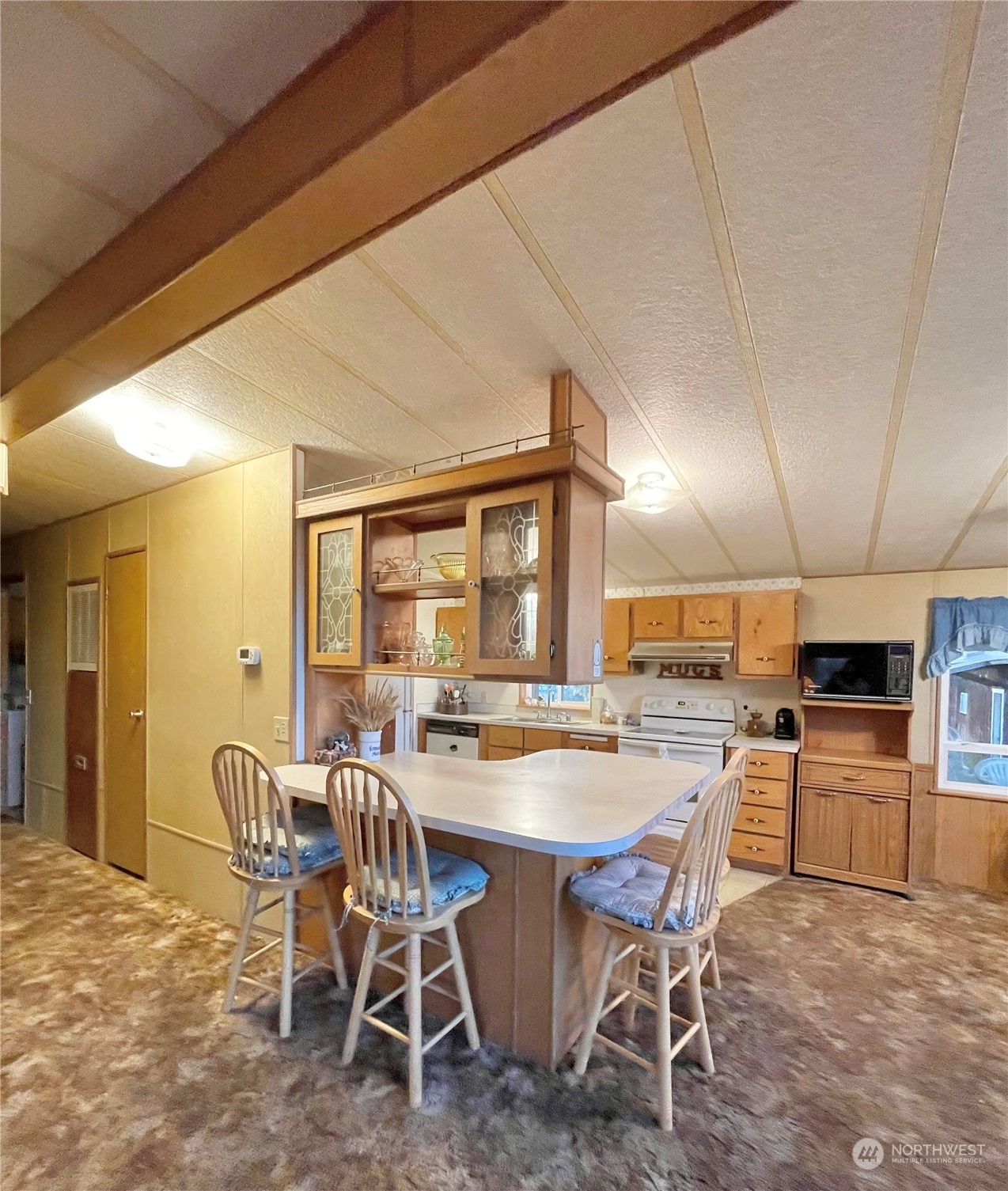 85 Duck Lake Road Omak, WA 98841 - Photo 13 of 31 a dining room with furniture and window