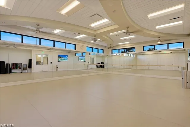 an aerial view of a house with a lake view