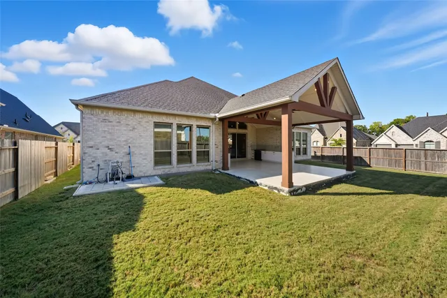 a house view with a garden space