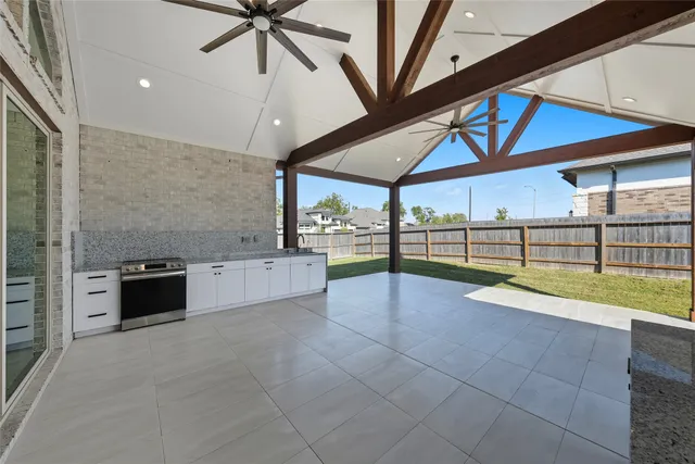 a view of an entryway with a table and chairs
