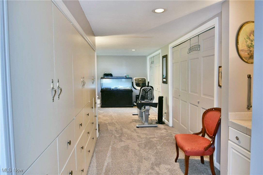 519 Butler Road Northeast Warren, OH 44483 - Photo 36 of 50 Corridor featuring light colored carpet