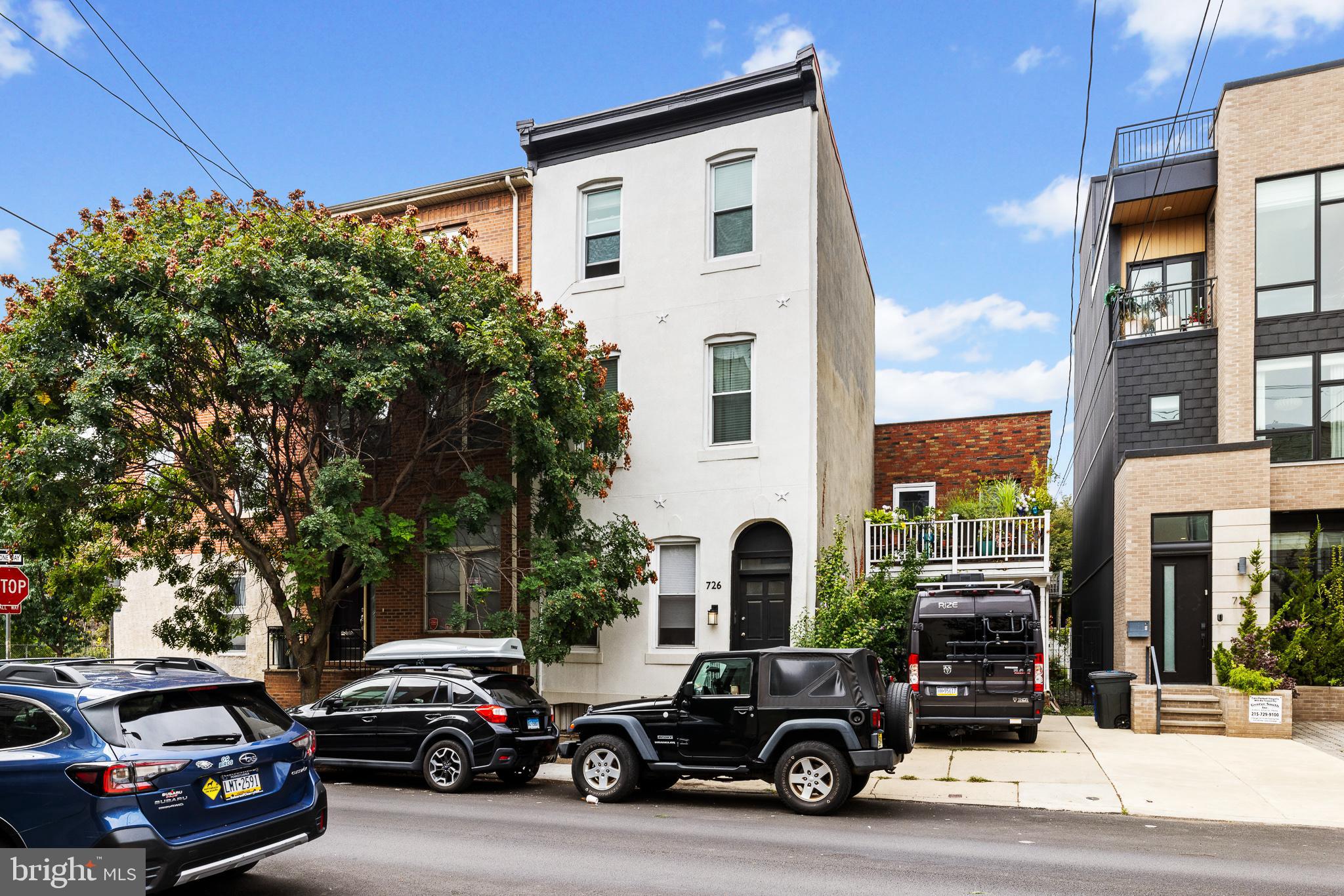 726 South 19th Street Philadelphia, PA 19146 - Photo 1 of 12 a view of a cars park in front of a building