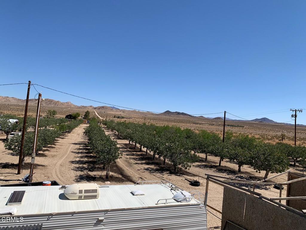 10080 Santa Fe Fire Road Lucerne Valley, CA 92356 - Photo 21 of 36 a view of a terrace with a lake view
