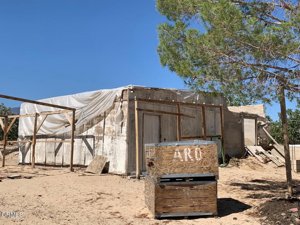 10080 Santa Fe Fire Road Lucerne Valley, CA 92356 - Photo 27 of 36 a view of a entryway door of the house