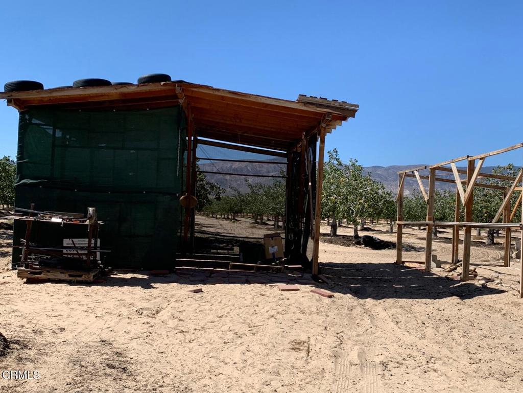10080 Santa Fe Fire Road Lucerne Valley, CA 92356 - Photo 28 of 36 a view of a house with a yard