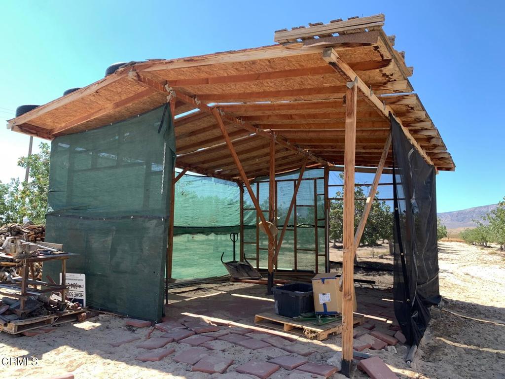 10080 Santa Fe Fire Road Lucerne Valley, CA 92356 - Photo 8 of 36 a view of house with backyard