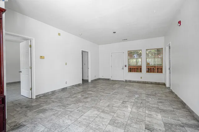 an empty room with windows