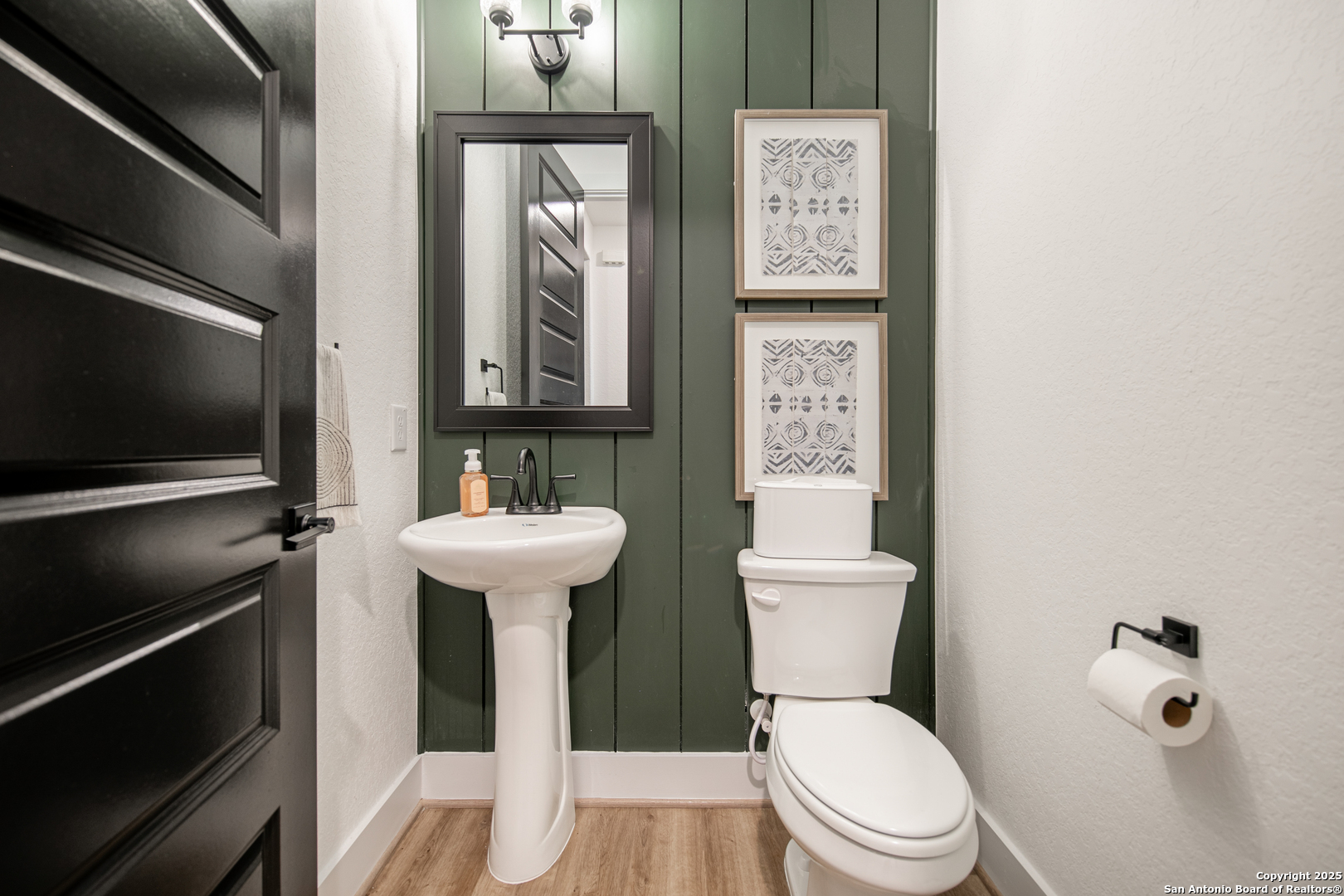 527 Corwin Springs Cibolo, TX 78108 - Photo 13 of 21 a bathroom with a toilet sink and mirror