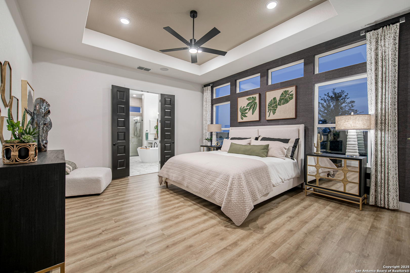 527 Corwin Springs Cibolo, TX 78108 - Photo 14 of 21 a bedroom with a large bed a flat tv screen and dresser