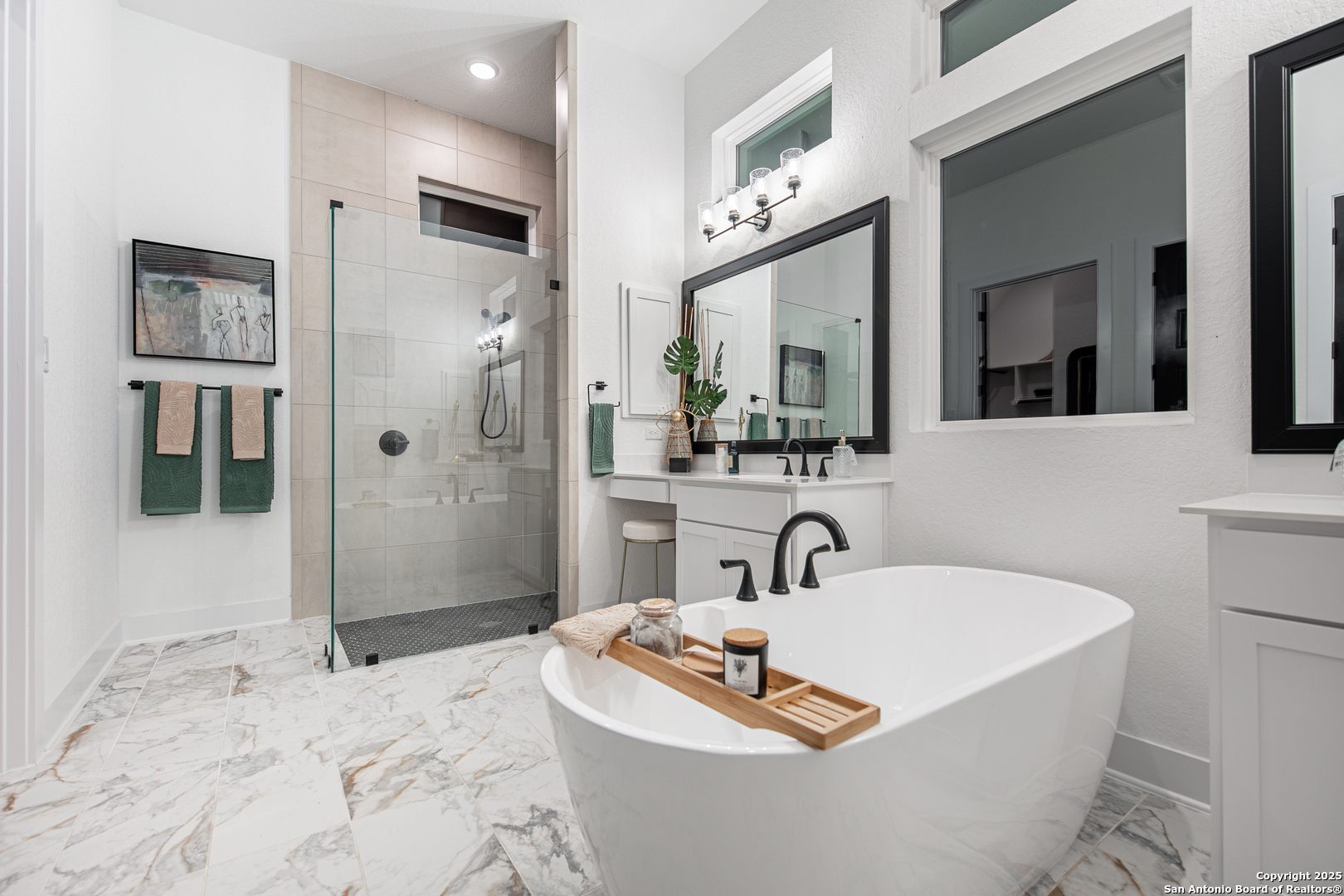 527 Corwin Springs Cibolo, TX 78108 - Photo 17 of 21 a bathroom with a tub sink and mirror