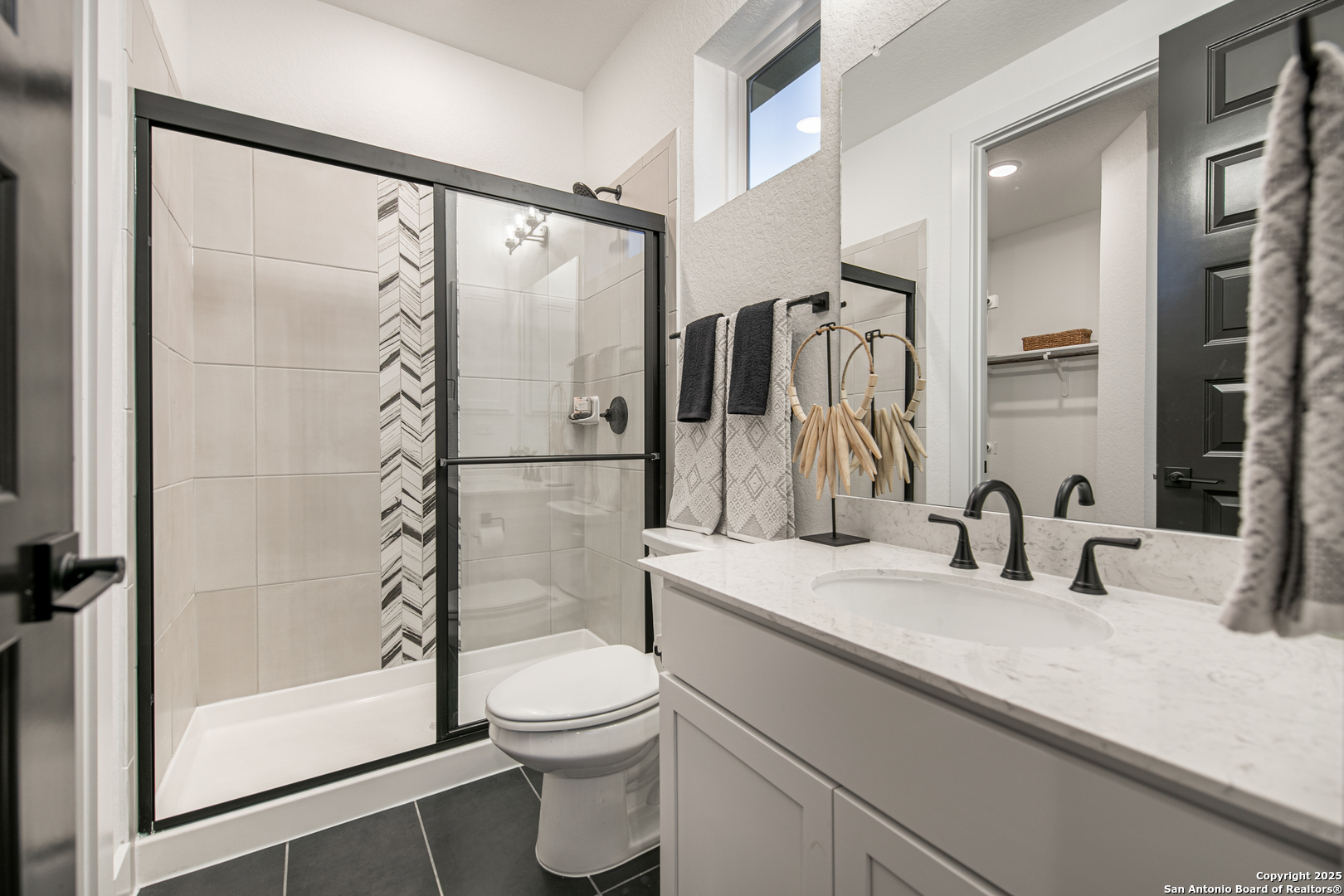 527 Corwin Springs Cibolo, TX 78108 - Photo 21 of 21 a bathroom with a sink a toilet and shower