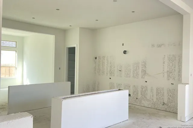 a spacious bathroom with a bathtub and shower