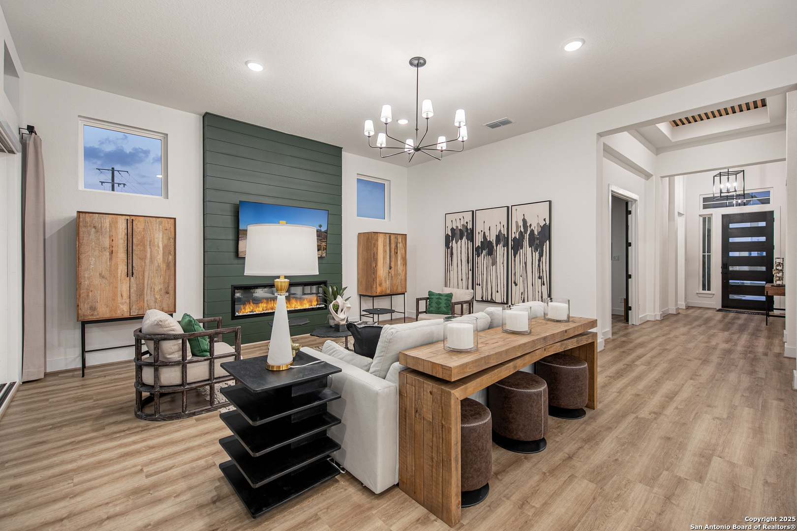 527 Corwin Springs Cibolo, TX 78108 - Photo 9 of 21 a living room with furniture and a chandelier