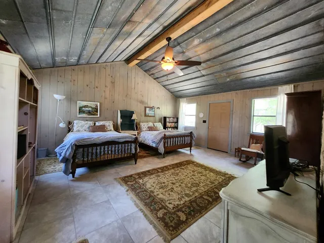 a bedroom with furniture