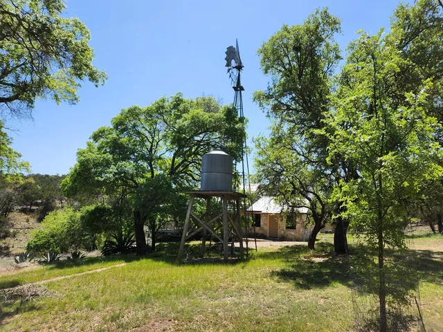 a view of a table and chairs in the patio