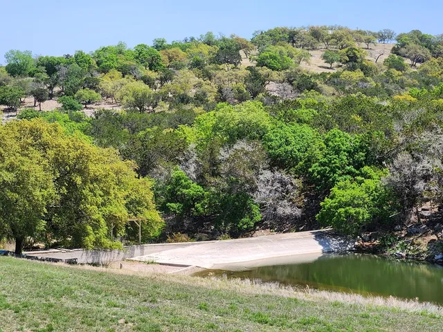 a view of a lake with houses