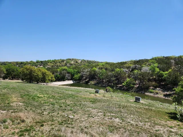 a big yard with lots of green space and fog