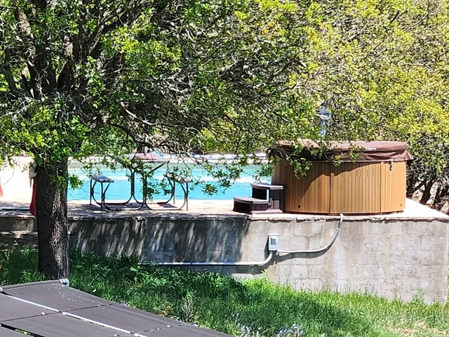a backyard of a house with lots of green space
