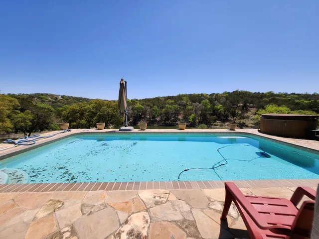 a view of a city with a yard