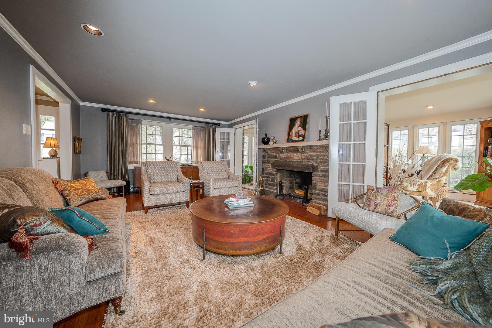 517 Howe Road Merion Station, PA 19066 - Photo 13 of 71 a living room with furniture and a fireplace