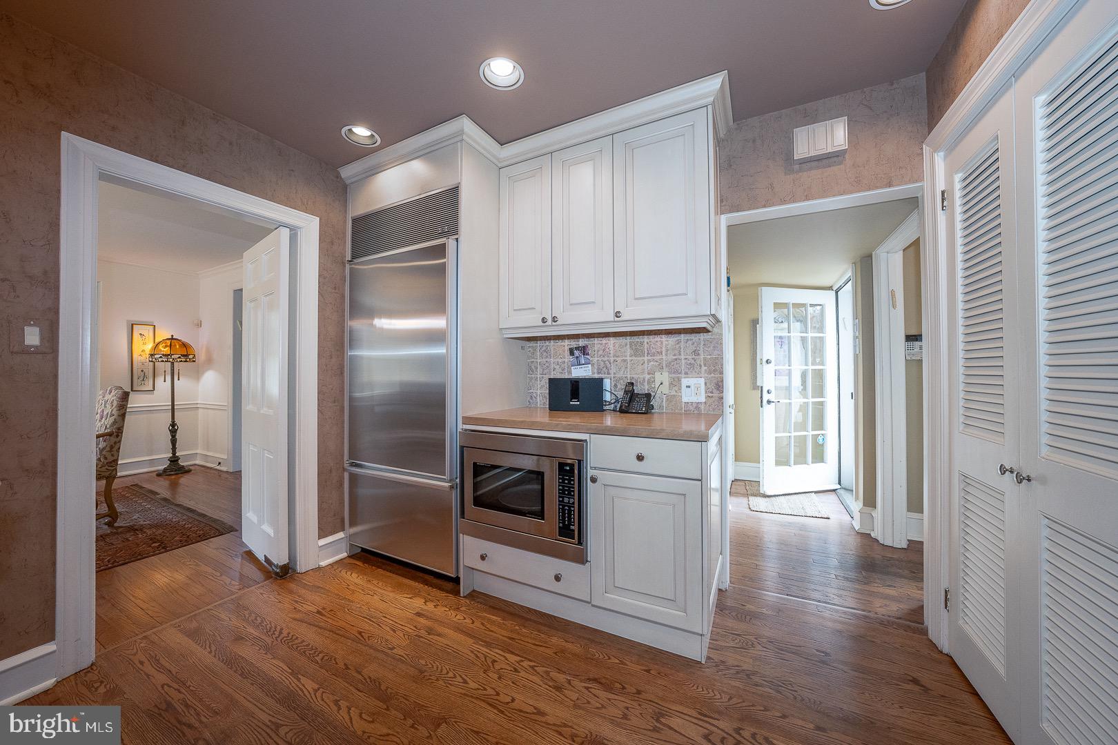 517 Howe Road Merion Station, PA 19066 - Photo 19 of 71 a kitchen with stainless steel appliances granite countertop a refrigerator and a stove top oven