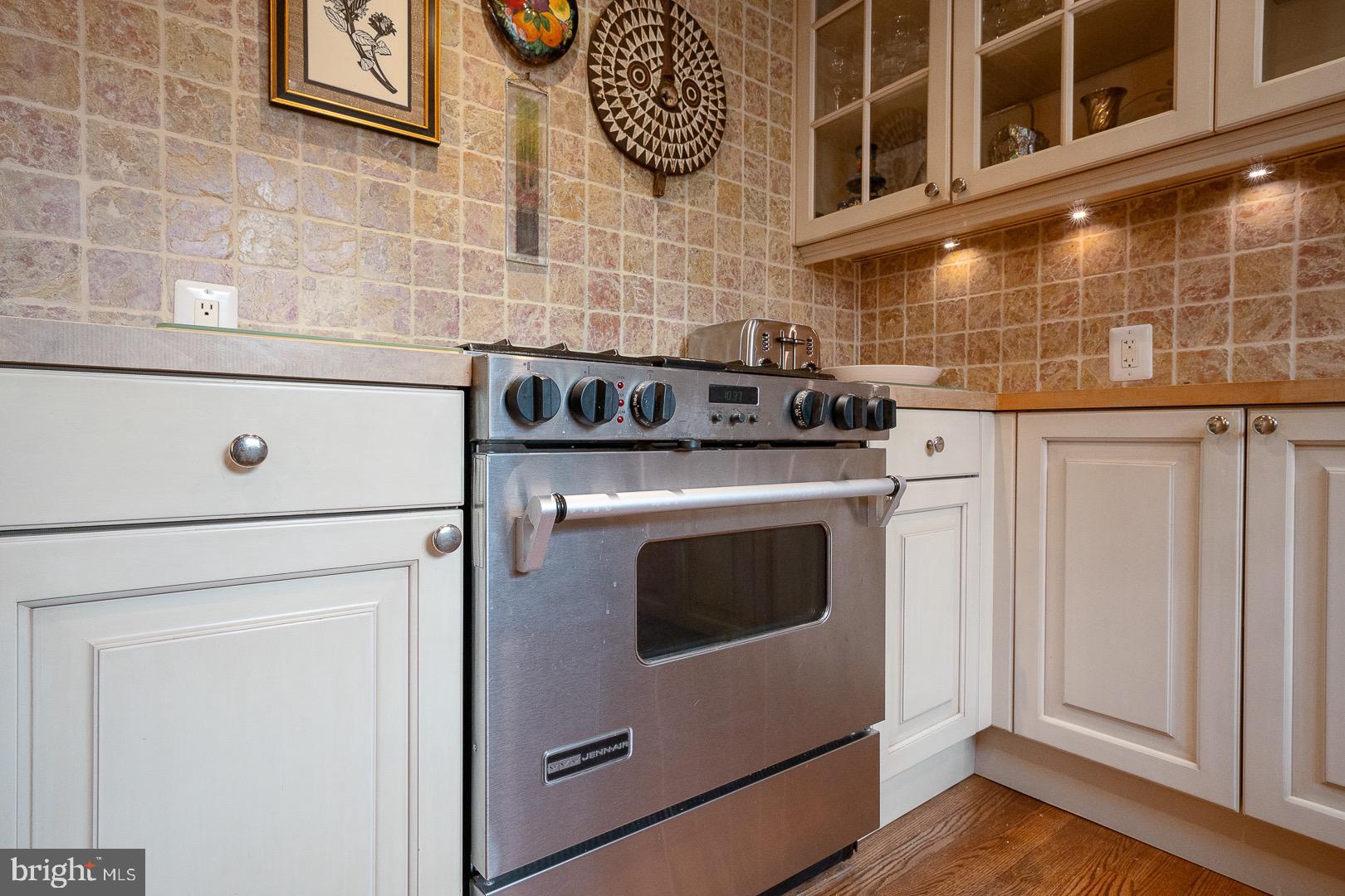 517 Howe Road Merion Station, PA 19066 - Photo 22 of 71 a stove top oven sitting inside of a kitchen