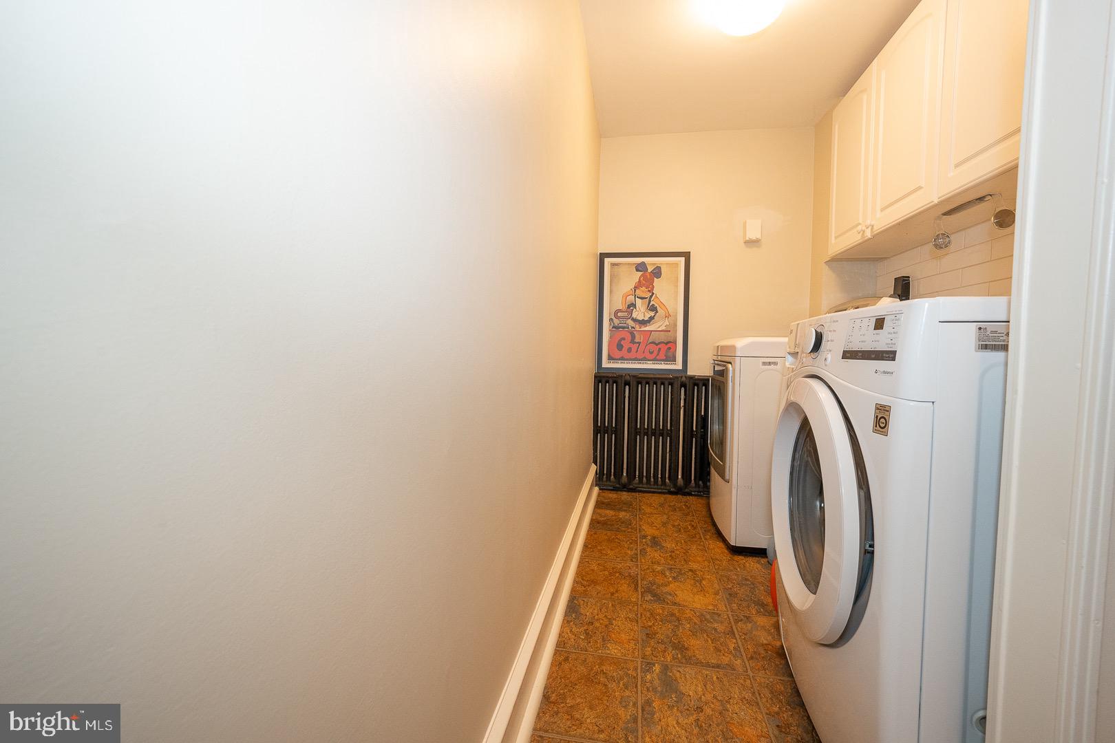 517 Howe Road Merion Station, PA 19066 - Photo 27 of 71 a utility room with dryer and washer