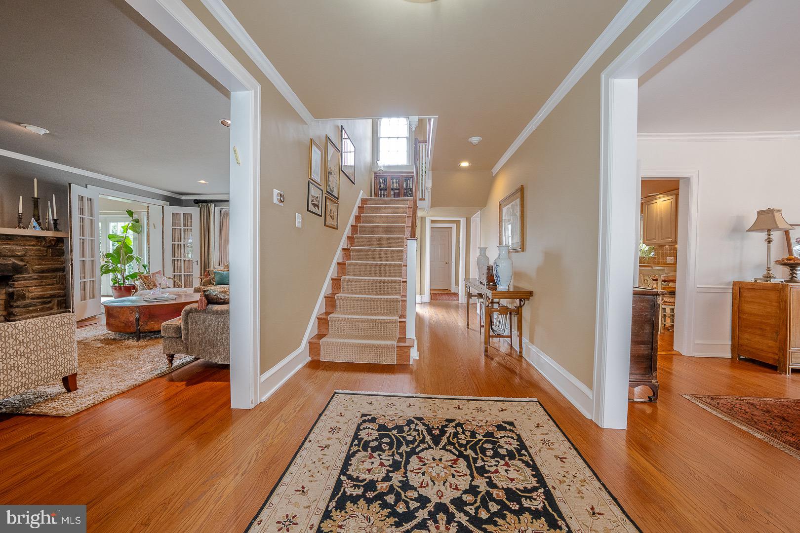 517 Howe Road Merion Station, PA 19066 - Photo 4 of 71 a view of a hallway view with wooden floor and a rug