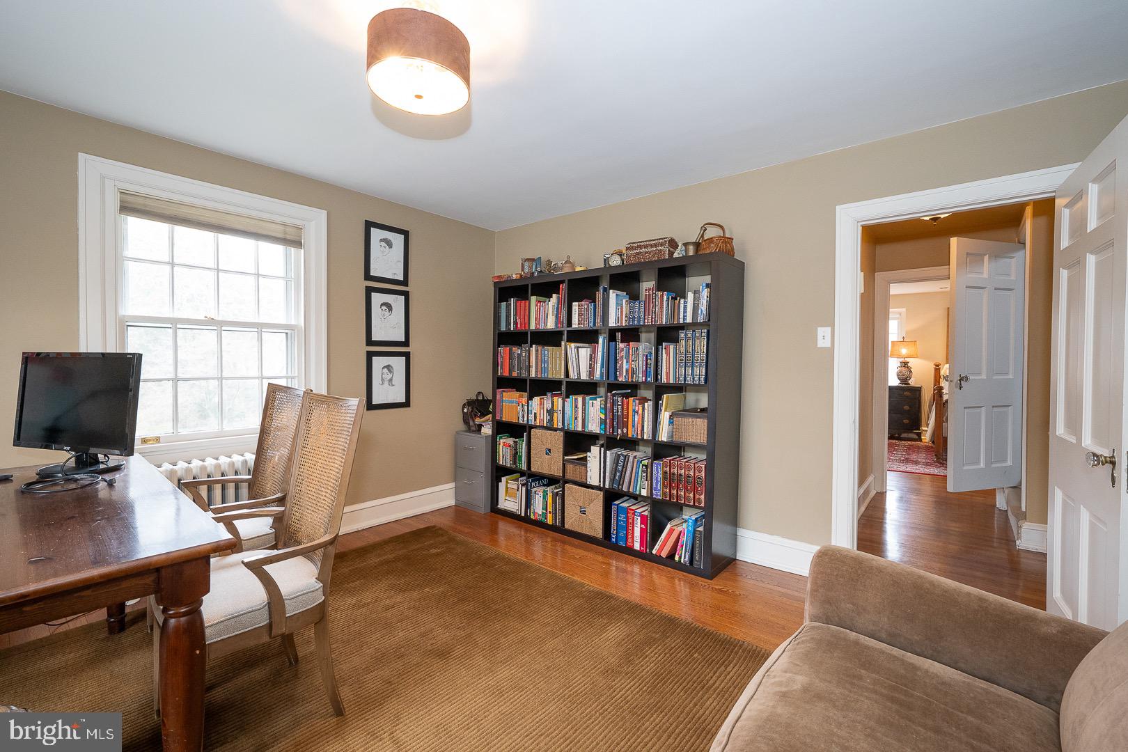 517 Howe Road Merion Station, PA 19066 - Photo 43 of 71 a view of a livingroom with workspace and a window