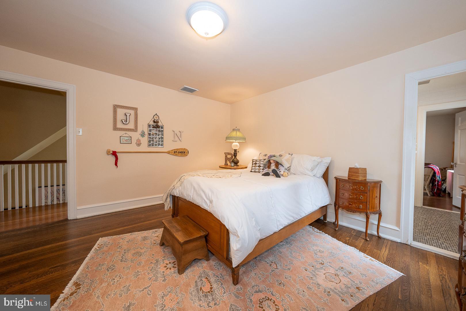 517 Howe Road Merion Station, PA 19066 - Photo 45 of 71 a bedroom with a bed and a table in it