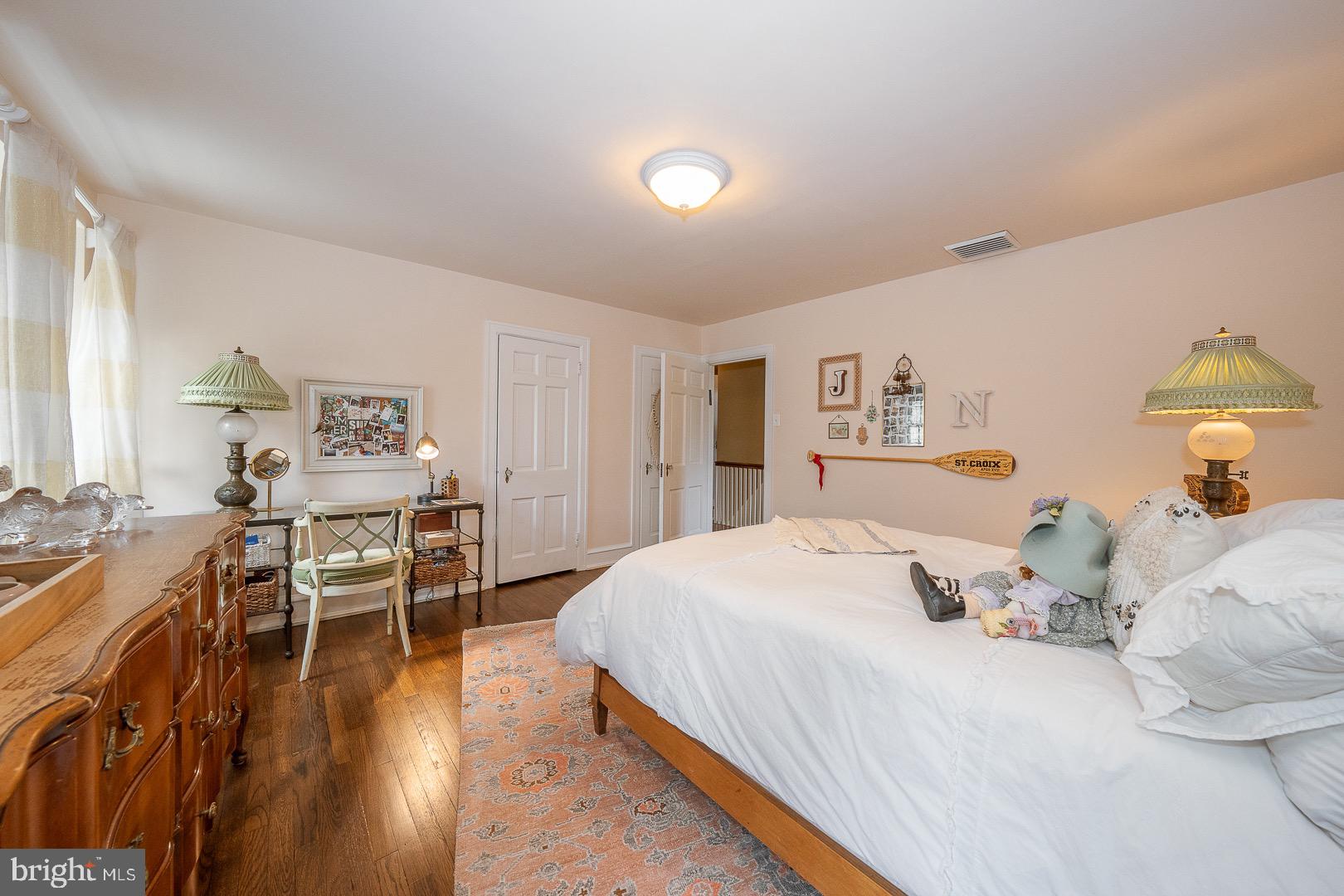 517 Howe Road Merion Station, PA 19066 - Photo 49 of 71 a bedroom with a bed and wooden floor
