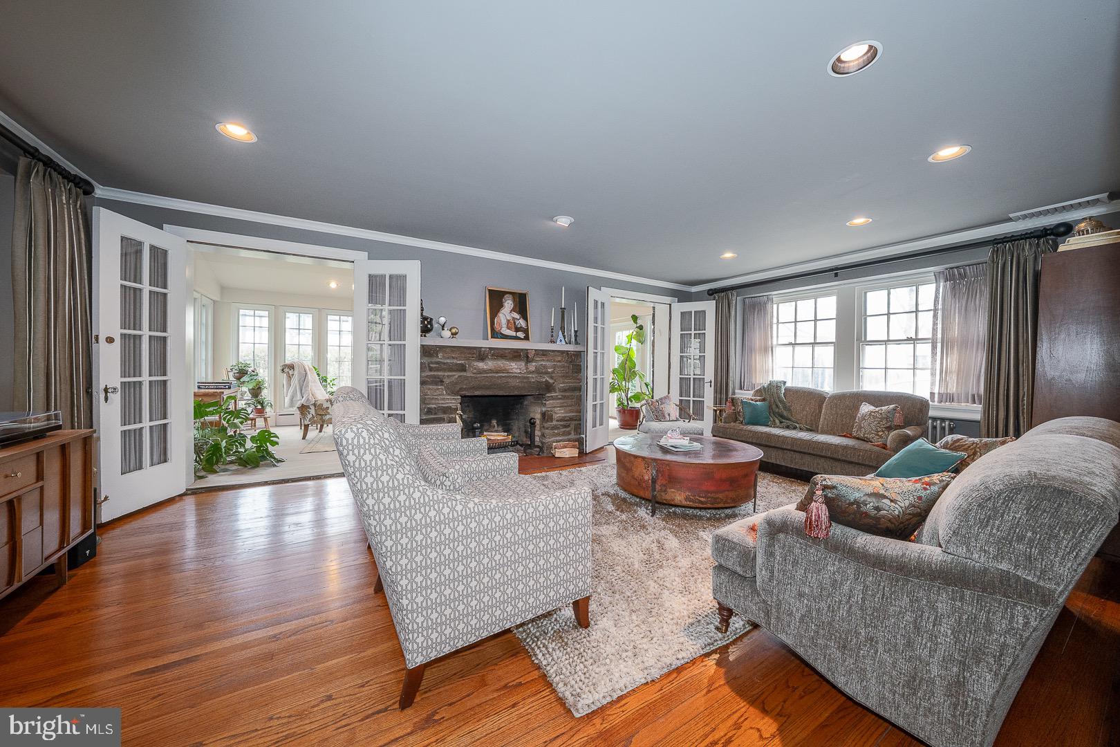 517 Howe Road Merion Station, PA 19066 - Photo 6 of 71 a living room with fireplace furniture and a wooden floor