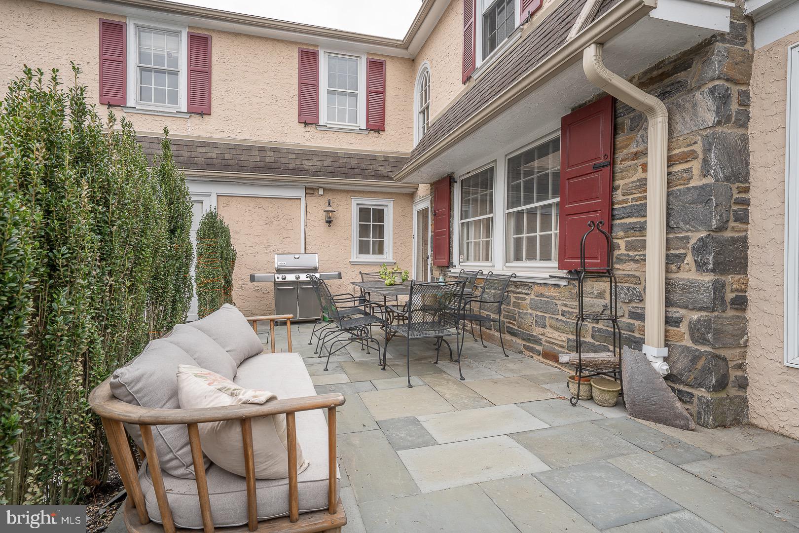 517 Howe Road Merion Station, PA 19066 - Photo 68 of 71 a view of backyard with a table and chairs and a barbeque