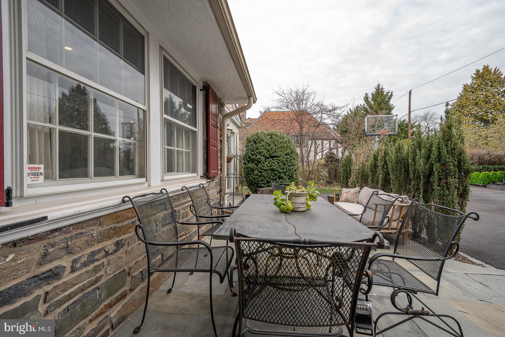 517 Howe Road Merion Station, PA 19066 - Photo 70 of 71 a view of a patio with a table and chairs