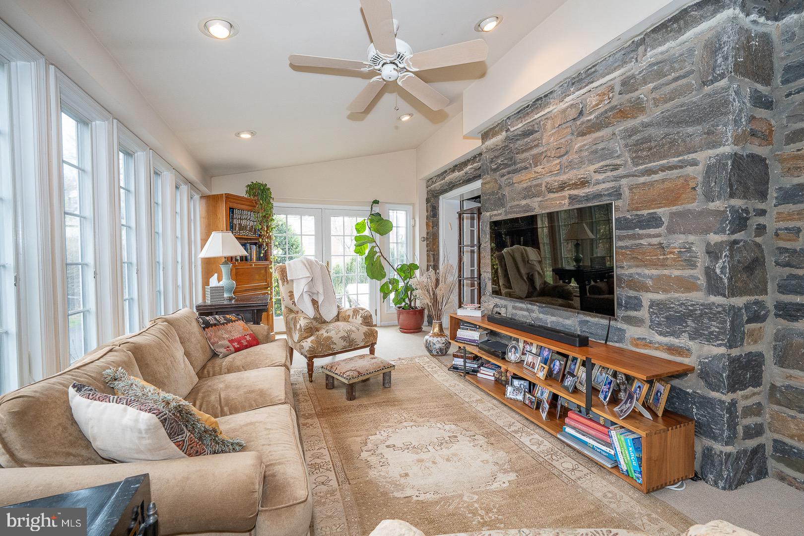 517 Howe Road Merion Station, PA 19066 - Photo 10 of 71 a living room with furniture and a flat screen tv