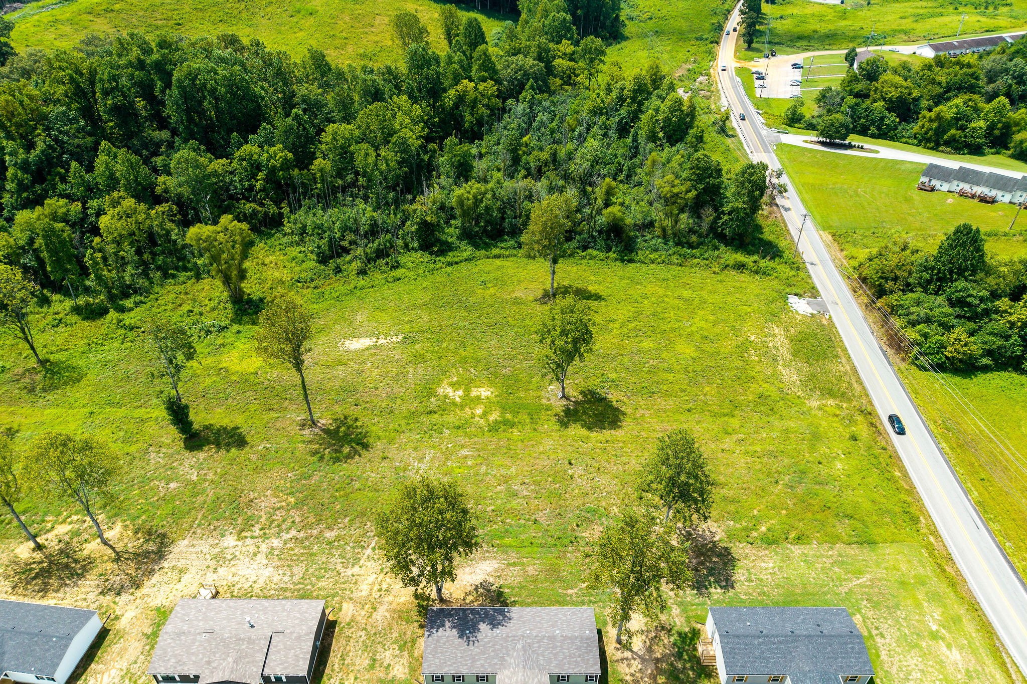 0 Dodson Branch Road Cookeville, TN 38501 - Photo 21 of 26 a view of an swimming pool and a yard
