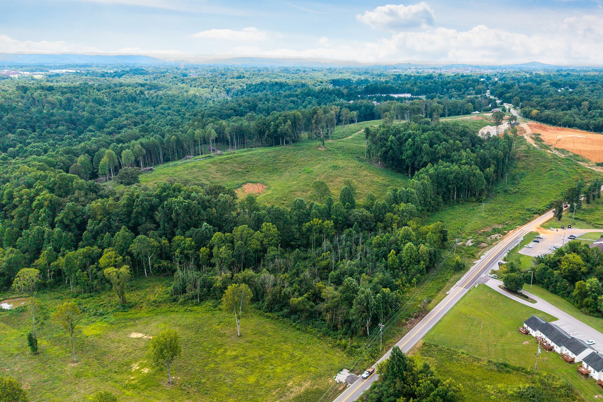 0 Dodson Branch Road Cookeville, TN 38501 - Photo 5 of 26 a view of a city with lush green forest
