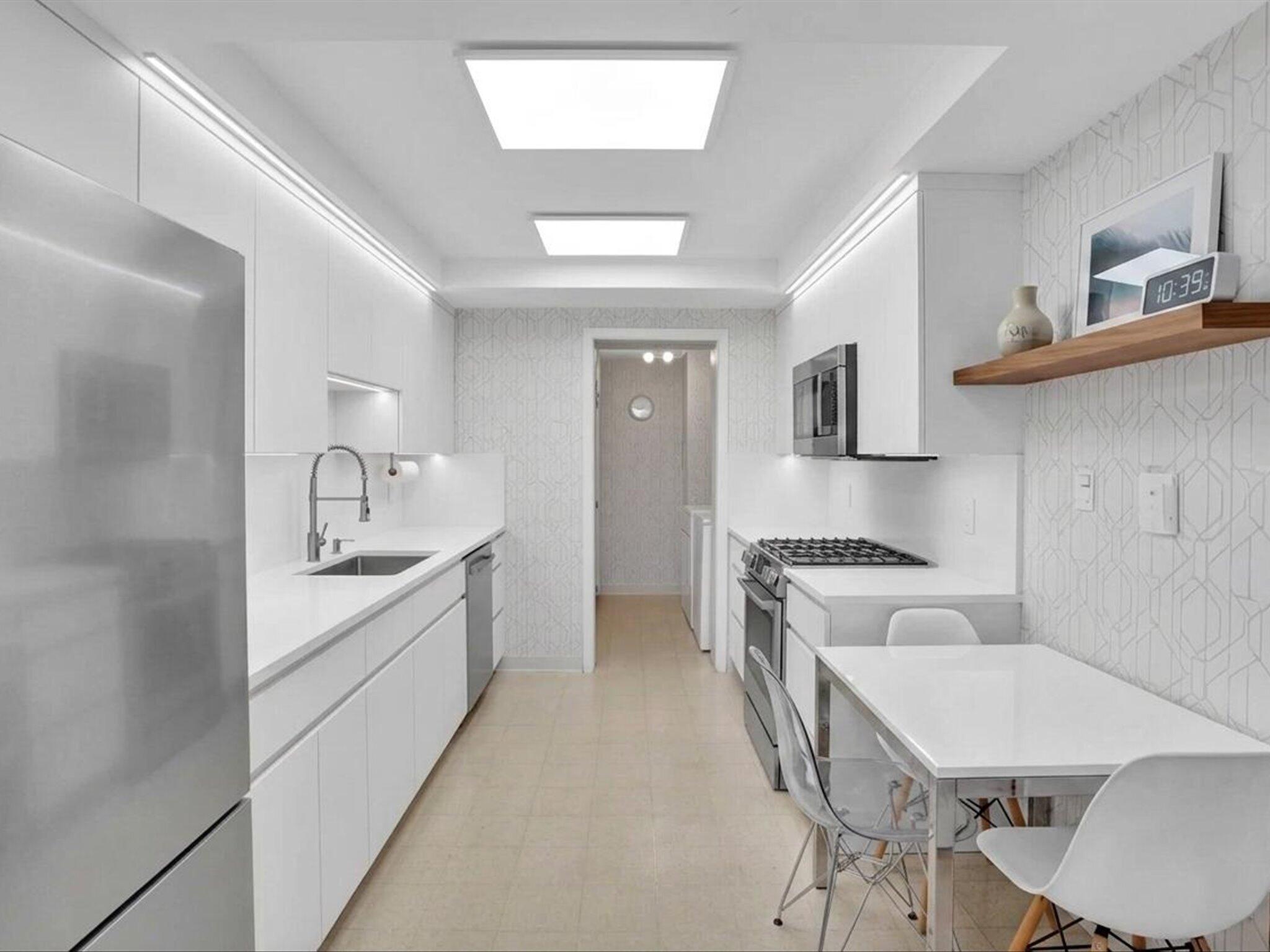 50 E Road, Unit 12F Delray Beach, FL 33483 - Photo 24 of 54 37-DSC00736_renovated Kitchen