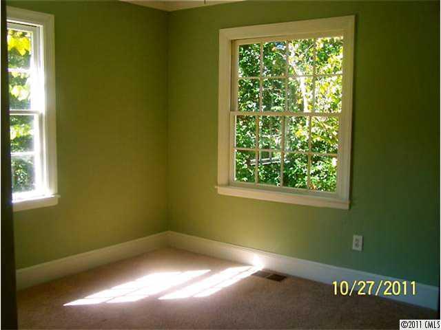 14024 Cabarrus Road Charlotte, NC 28227 - Photo 8 of 12 a view of empty room with window