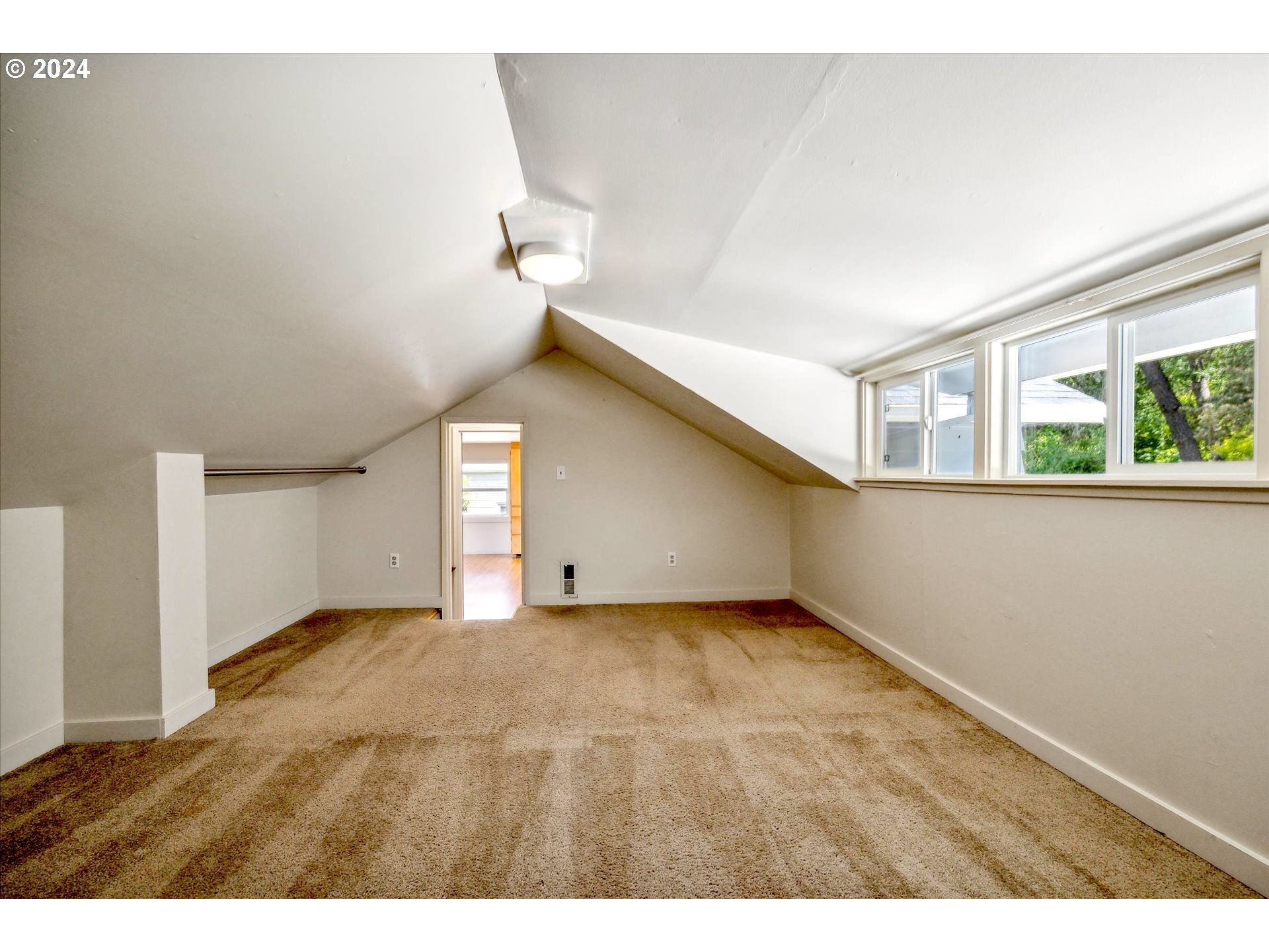 10097 Southwest Walker Road Portland, OR 97225 - Photo 34 of 44 a view of a room with a window