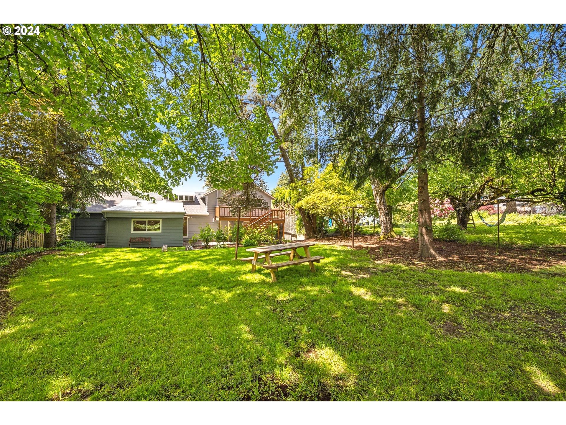 10097 Southwest Walker Road Portland, OR 97225 - Photo 39 of 44 a house view with a garden space