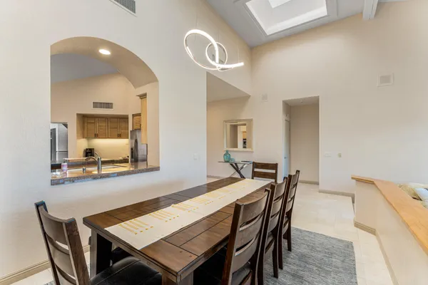 a view of a dining room with furniture