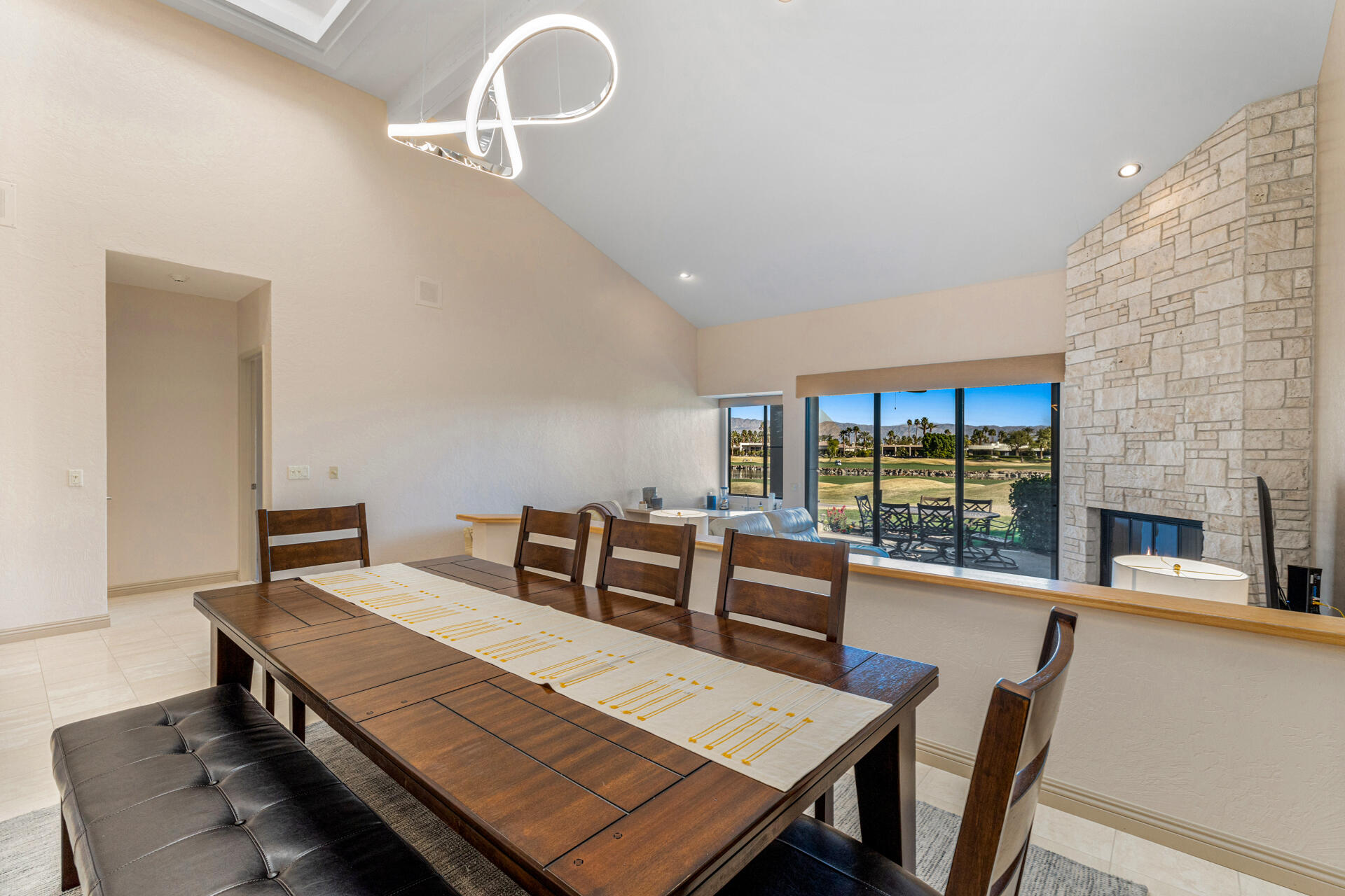 55764 Oak-Tree La Quinta, CA 92253 - Photo 15 of 50 a view of a dining room with furniture window and outside view